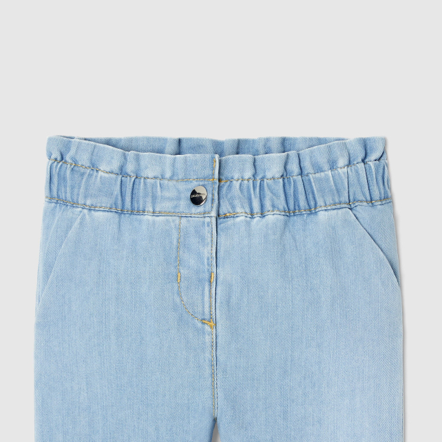 Baby girl trousers in light denim Baby girl trousers in light denim
