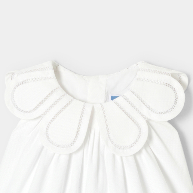 Baby girl romper in cotton piqué Baby girl romper in cotton piqué