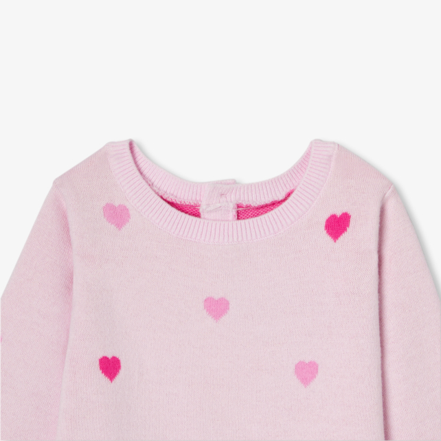 Combinaison bébé fille en tricot motif cœur Combinaison bébé fille en tricot motif cœur