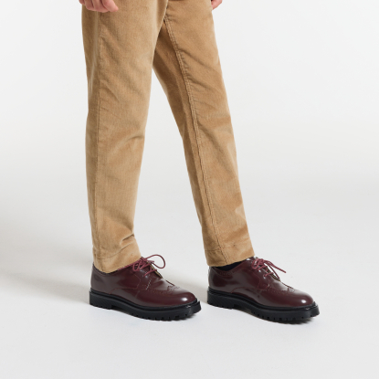 Boy derbies in glazed leather